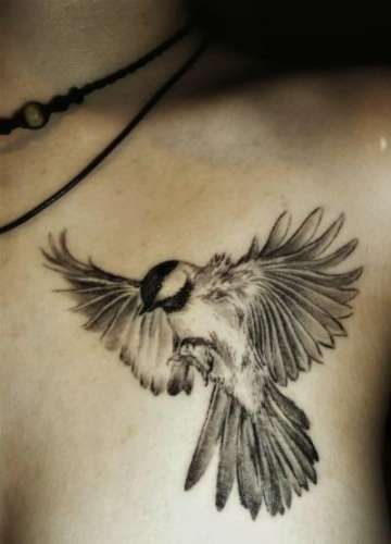 203534_shoulder-black-white-bird-tattoo.thumb.jpg